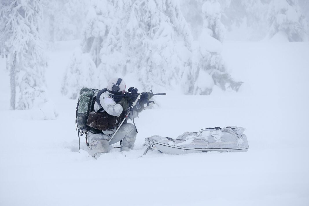Jegertroppen operator shooing during arctic warfare training