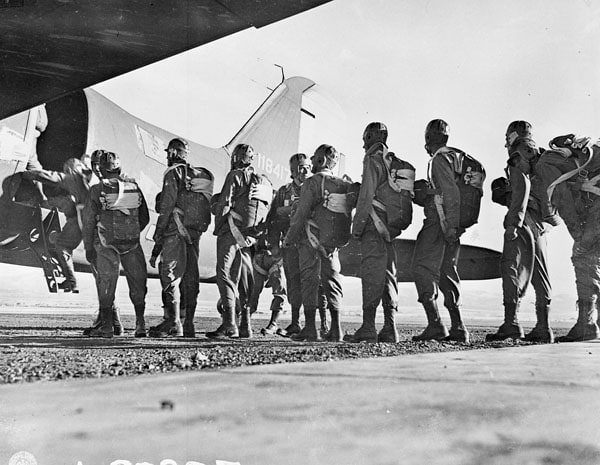 Personnel of the First Special Service Force boarding a Douglas C-47 aircraft for parachute training, Fort William Henry Harrison, Helena, Montana, United States 