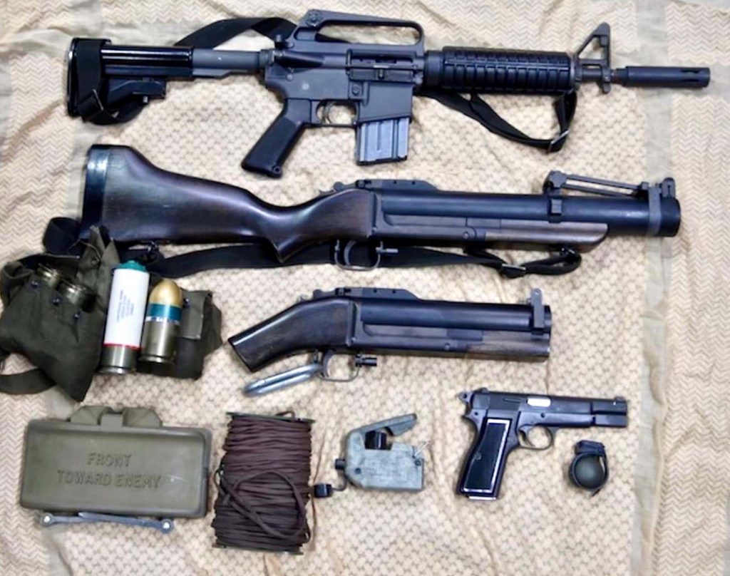 MACV-SOG loadout laid out on a cloth.