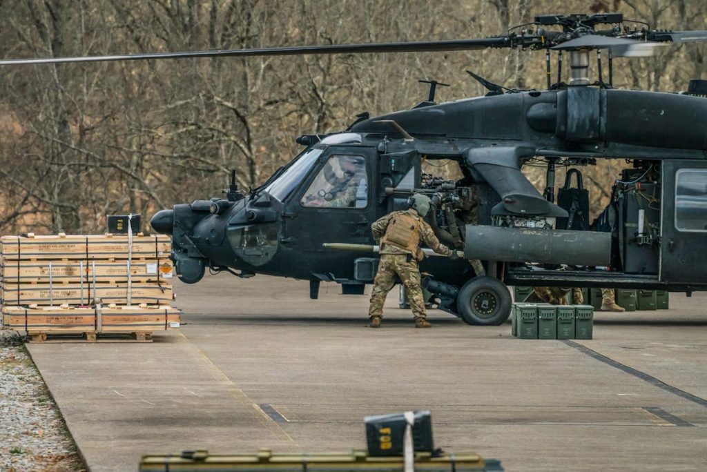 160th SOAR’s MH60L, gunship configuration known as DAP (Direct Action Penetrator). Crew members loading up the Blackhawk with Hydra 70 rockets and ammo for the M134 Miniguns.