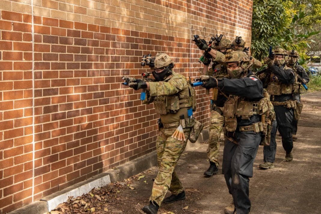 Australian soldiers from the 2nd Commando Regiment (2 CDO REGT) conduct counter terrorism training with the Japanese soldiers from the Special Forces Group (SFGp) at a Paramatta factory in Sydney.