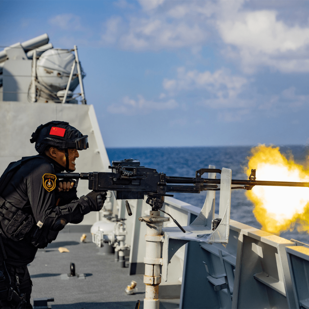 PLAN sailor firing heavy machine gun during vale exercise