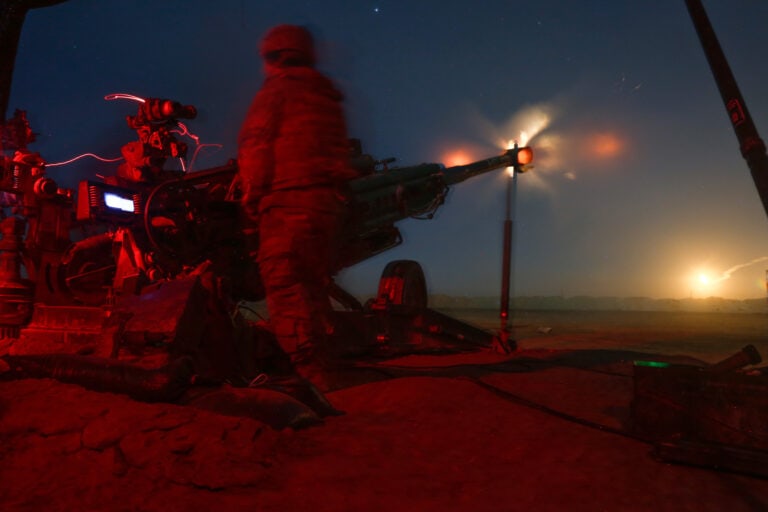 US artillerymen of the 3rd Cavalry fire an M777 in support of Iraqi Security Forces