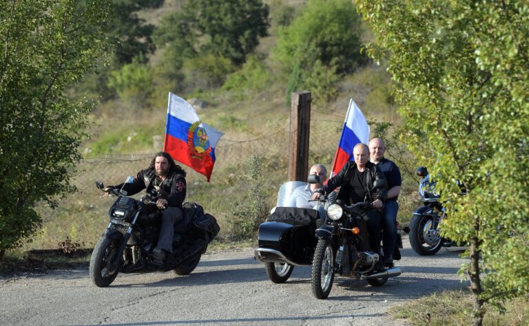 Image shows Russian President Vladimir Putin with the far-right motorbike gang, the Night Wolves
