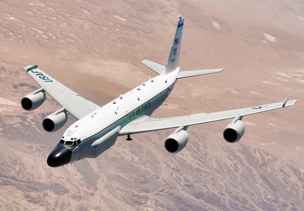 RC-135 Rivet Joint reconnaissance aircraft moves into position behind a KC-135T/R Stratotanker over Southwest Asia with the 763rd Expeditionary Reconnaissance Squadron, in Southwest Asia, from 343rd Reconnaissance Squadron (U.S. Air Force photo by Master Sgt. Lance Cheung)