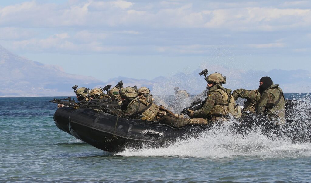 GOE operatives training maritime assault in a semi-rigid boat.
