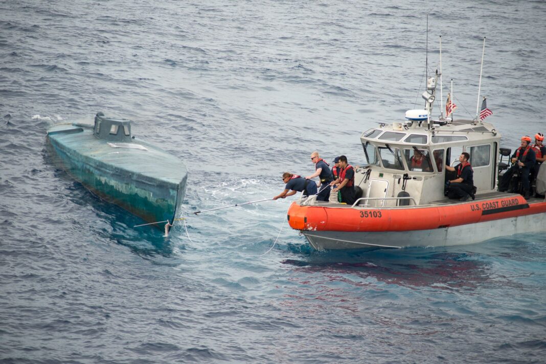 US Coast Guard Cutter boarding a narco submarine in the Eastern Pacific.