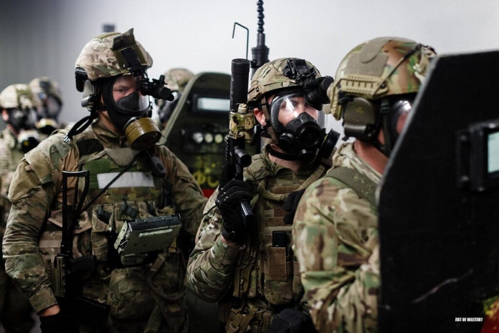 FSB Alpha personnel in kit wearing gas masks potentially getting ready to breach during a training exercise 