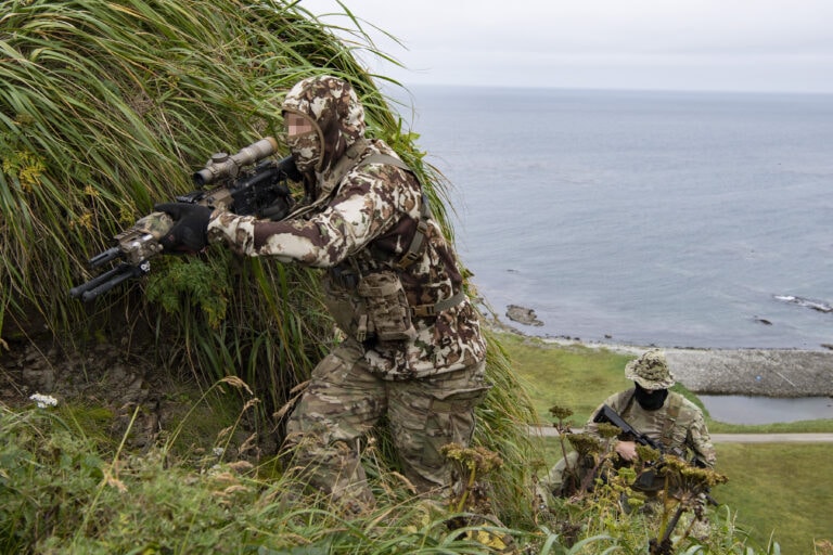 East-Coast-based U.S. Naval Special Warfare Operators (SEALs) conduct a patrol on Shemya Island