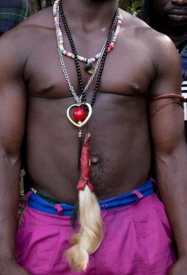 An Amba Boy adorned in OdeshI charms