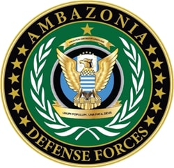 ADF Coat of Arms. It is a circular medallion on which depicted in bas-relief is a golden Dove adorning the Ambazonia Flag. It consists of a green circle, with gold edges, enclosed with a laurel wreath – potentially signifying the victory and honour of fallen Amba boys. It is further encircled in the upper edge by the lettering ‘Ambazonia’ and beneath the lower edge lettering ‘Defense Forces’. Twelve golden stars punctuate the lettering, with an additional one atop, which may symbolise the thirteen federated states of Ambazonia.