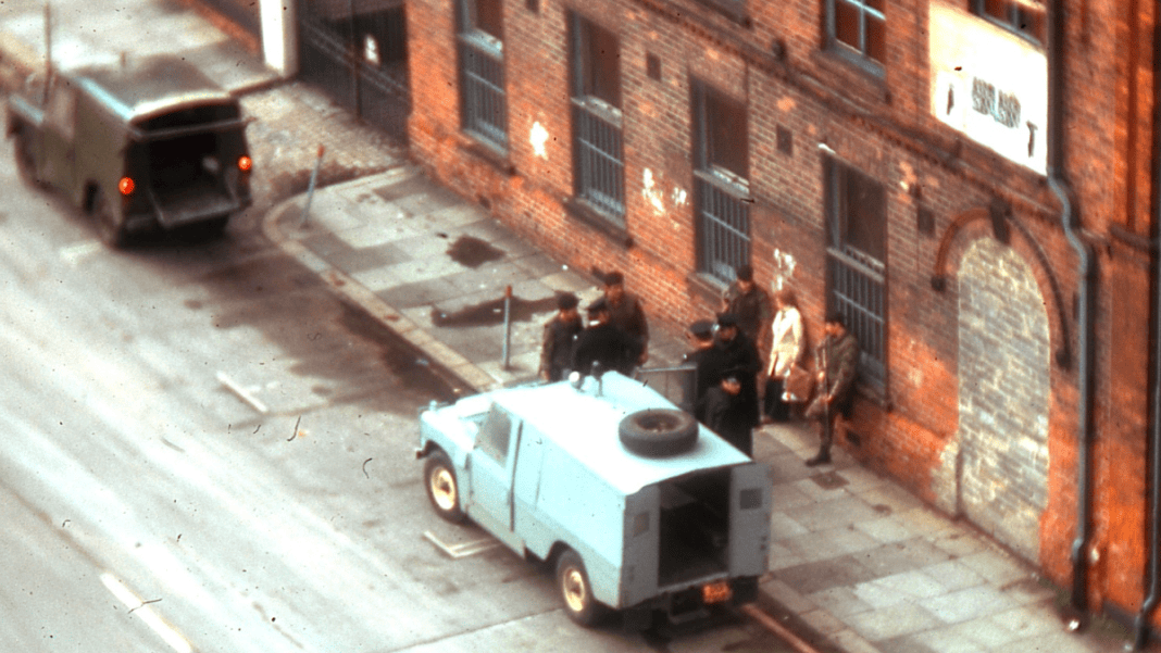 British troops and police, investigating two Irish, during The Troubles.