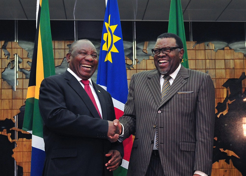 President Hage Geingob, part of the SWAPO party of Namibia, shaking hands with South African President Cyril Ramaphosa