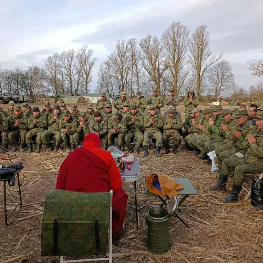 A group of Buryats gather in ceremony before entering battle In Ukraine.