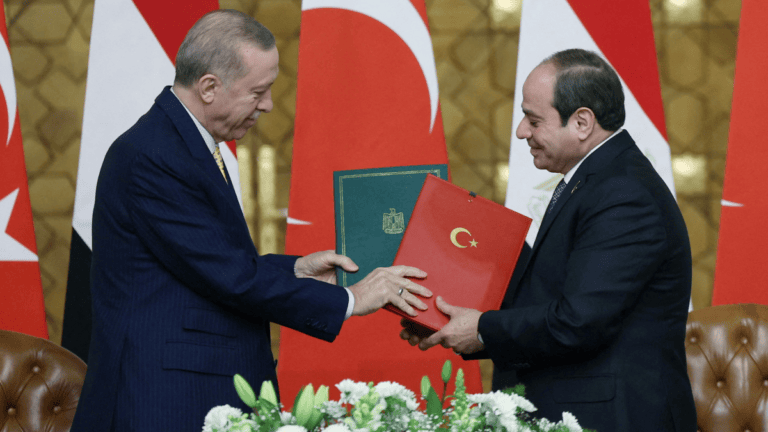 Turkish President Recep Tayyip Erdogan (left) and Egyptian President Abdel Fattah al-Sisi (right) exchange signed agreements after their meeting at the Ittihadiya Palace in Cairo, Egypt, Wednesday, February 14, 2024. Photo by: Turkish Presidency