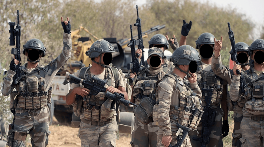 Sadat contractors with guns. Background with Toyota Hilux equipped with anti-aircraft artillery system.