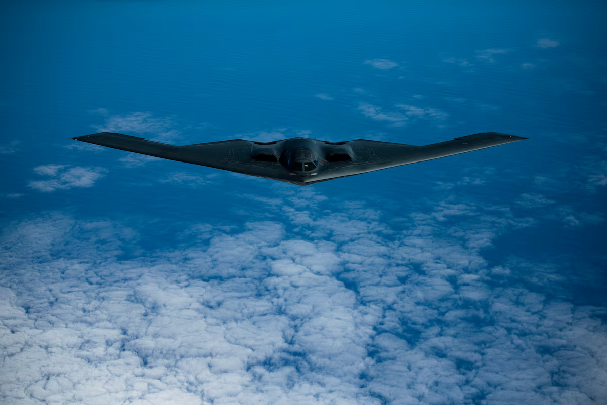 B-2 Bomber plane over a blue clouded sky. Bomber base is found at Diego Garcia.