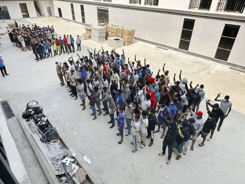 Foreign nationals said to have been rescued by the KNA are pictured at a site carrying out scam activities in eastern Myanmar in late February, 2025